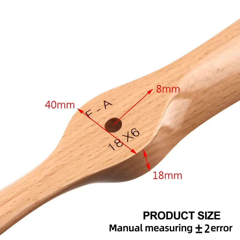Hélice pour avion RC mesurée avec un réglet, illustrant la taille précise de 18x10 pouces.