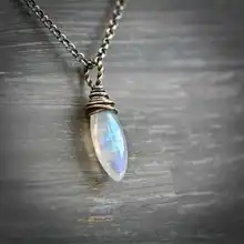  New Moonstone Necklace Retro Hollow Winding Flower Moon Pumpkin Luminous Stone Pendant Necklace Clavicle Chain Women's Jewelry 