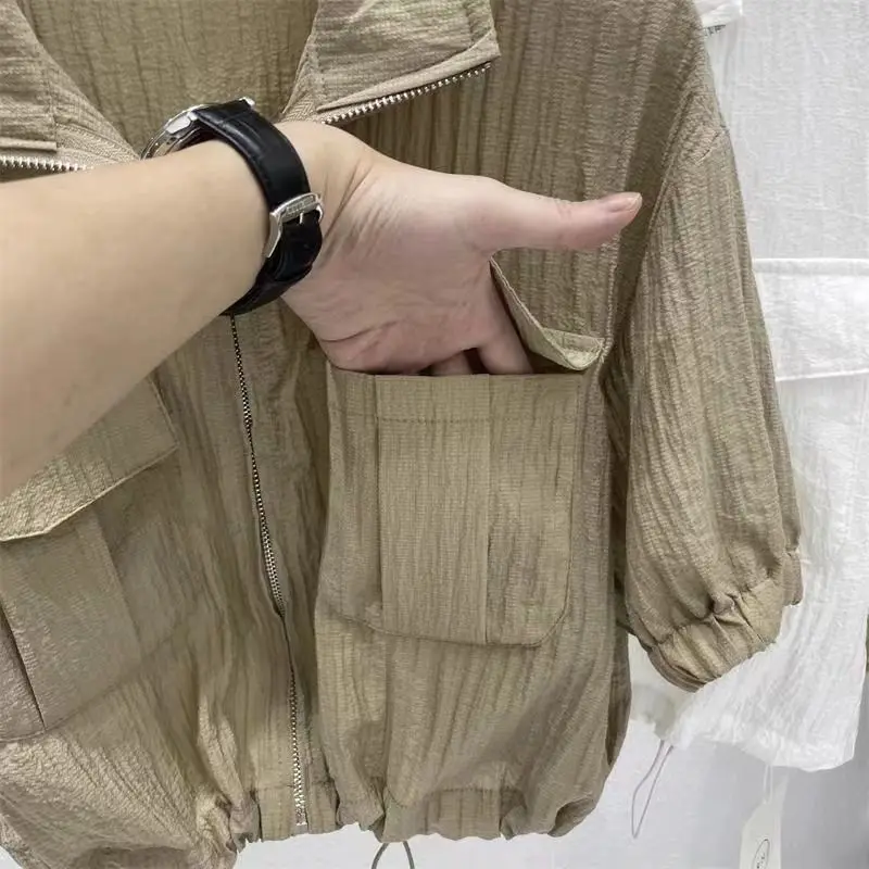 Coat women's 2024 summer tooling thin short design unique elastic drawstring zipper lapel short sleeve shirt.