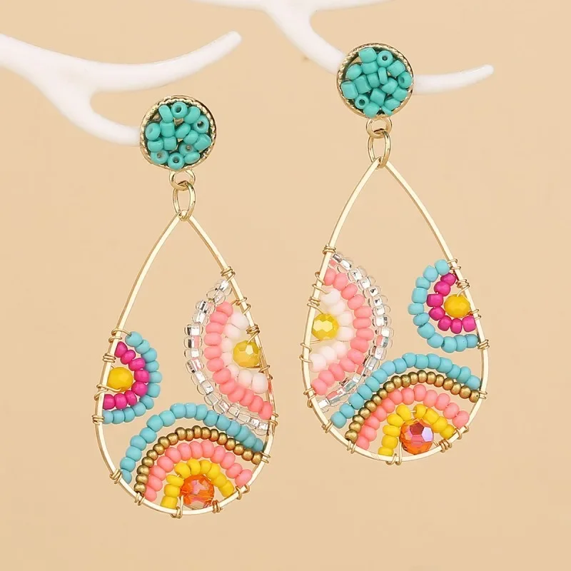 

Fringed earrings Hand woven Simplicity originality Beading Water droplet Hollow out Bohemia female Rice bead earrings