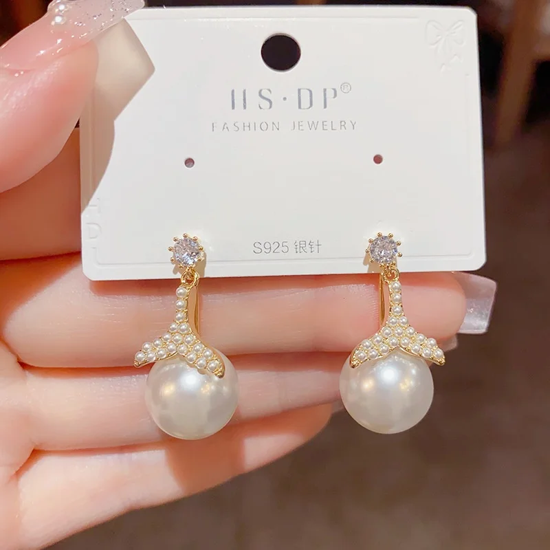 

Стильные милые модные изысканные темпераментные жемчужные серьги «рыбий хвост» в двух стилях серебряные серьги s925 высокого качества оптом