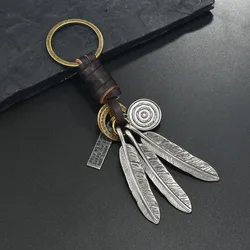 Vintage Irregular Metal & Leather Keychain Pendant with Animal and Feather Accents (E)