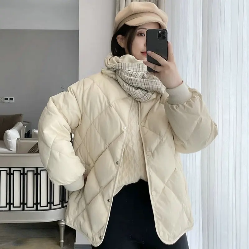 

2023 new short down jacket temperament commuting fashion collarless down jacket lightweight beige high-quality coat