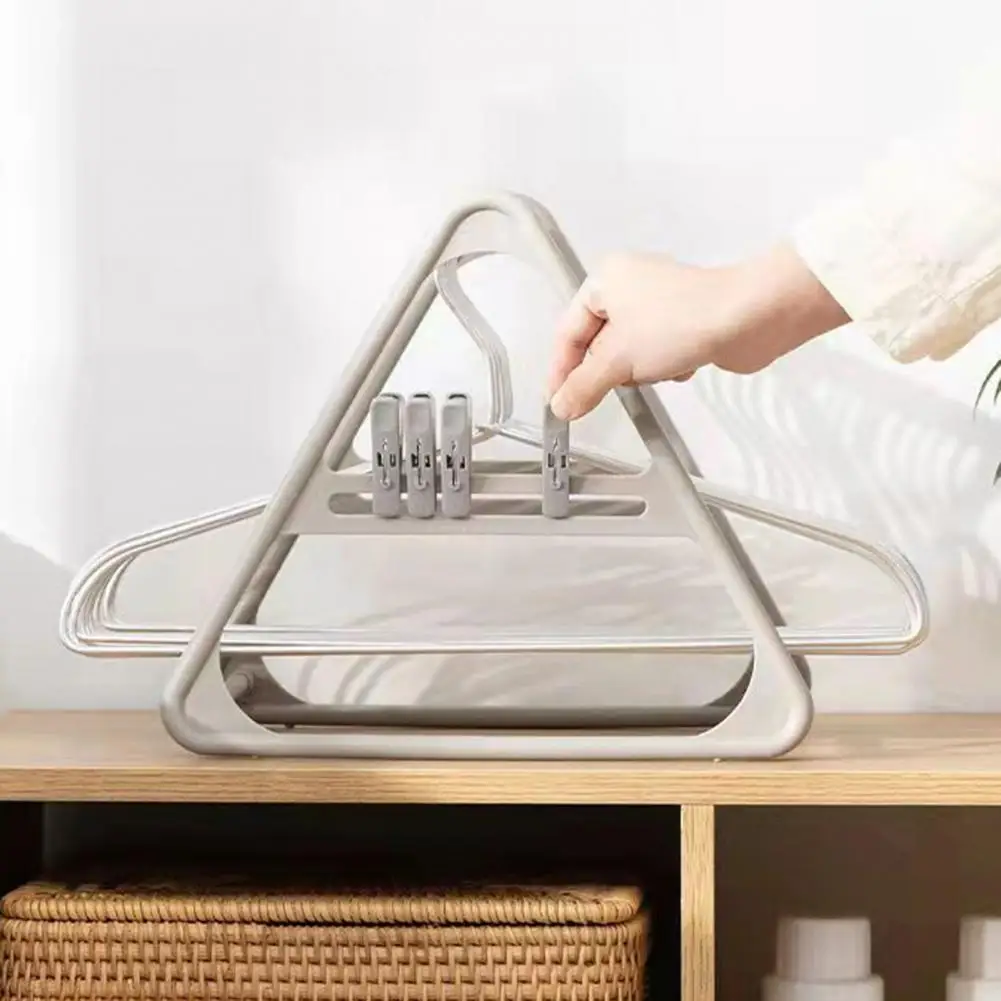 https://ae01.alicdn.com/kf/S5df1f9fca2ec4fecb3a3f2585dacc7a6M/Save-Space-Removable-Desktop-Type-Clothes-Hanger-Caddy-Stands-Home-Use.jpg