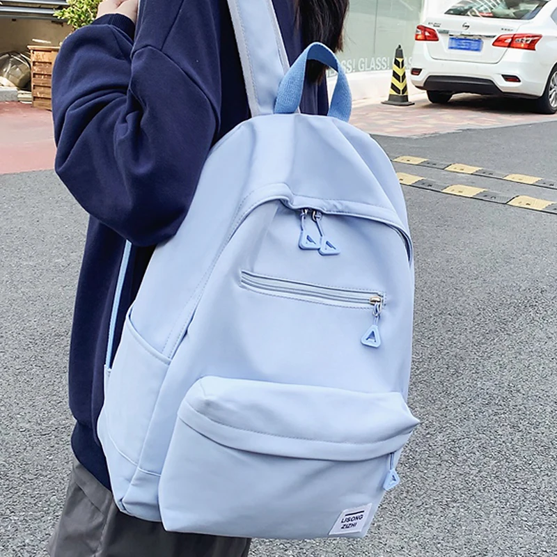 

2023 New Simple Design Woman Backpack School Bag For Teenage Girls Boys Casual Travel Rucksack College Students Mochila