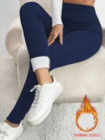 Plus size Women's thick thermal leggings with high waist and fleece lining.design for winter running yoga and workout activities