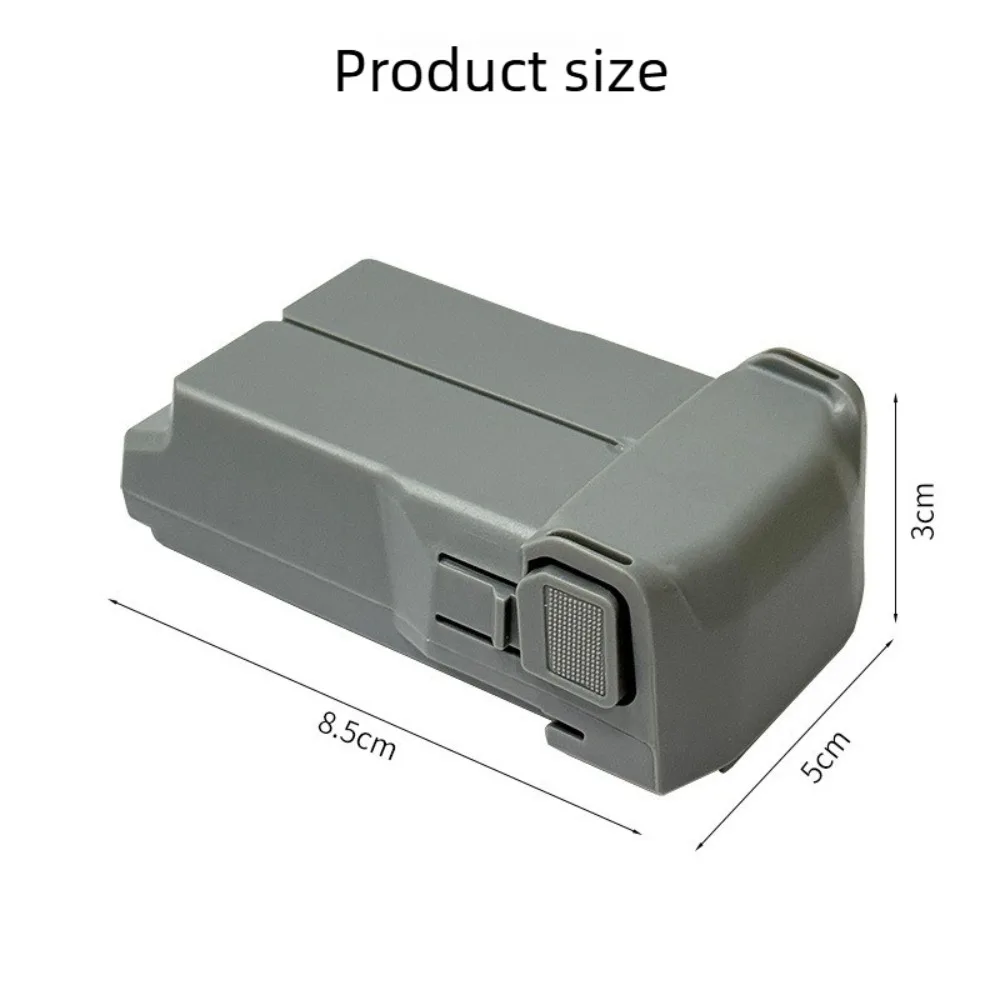 Main tenant la batterie intelligente 4680 mAh, mettant en évidence sa taille compacte et sa conception robuste.