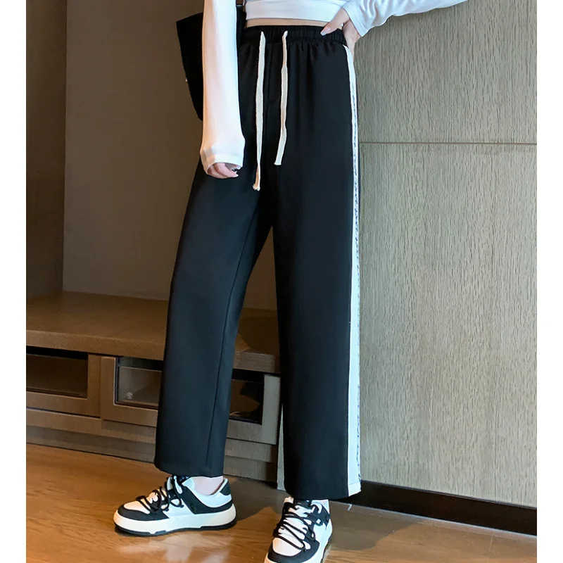 

Модные новые женские брюки Корейская версия большие спортивные свободные банановые брюки черные повседневные женские прямые брюки с завязками на осень