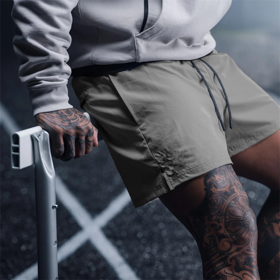 

2022 Summer New Gym Jogging Exercise Shorts Men's Sports Fitness Quick-drying Multiple pockets Running Shorts