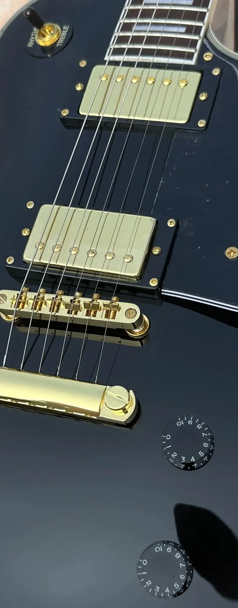 

Customized electric guitar, black beauty, gold accessories, in stock, lightning free shipping