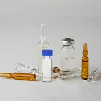 100 Pcs Vial Small Glass Jars Vials with Lids Lecythus Caps