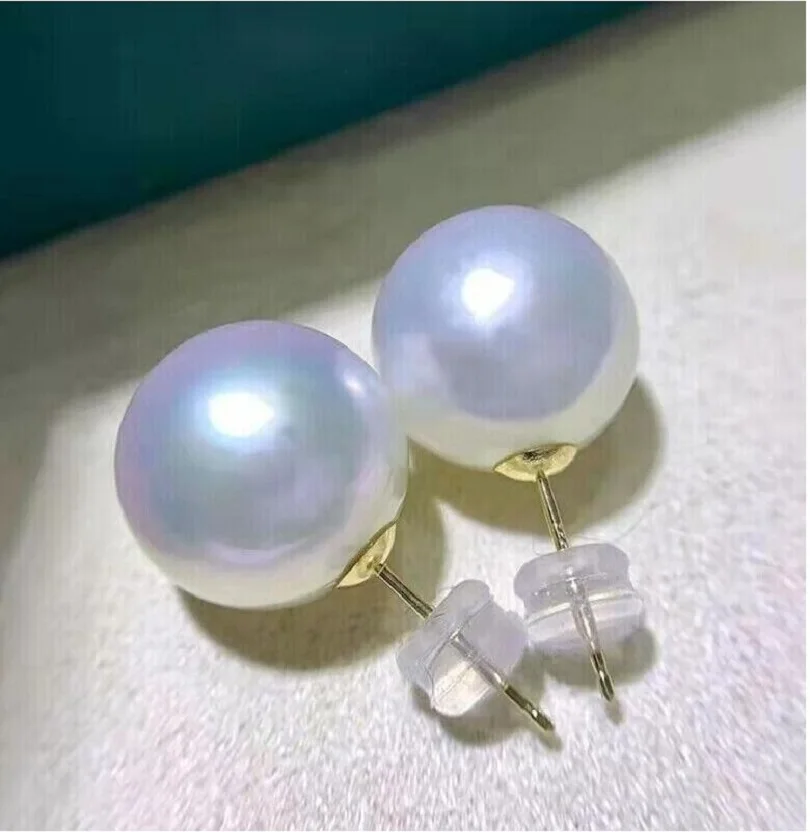 

Large amount of AAAAA 11-12mm circular natural South China Sea white pearl earrings in 18K gold