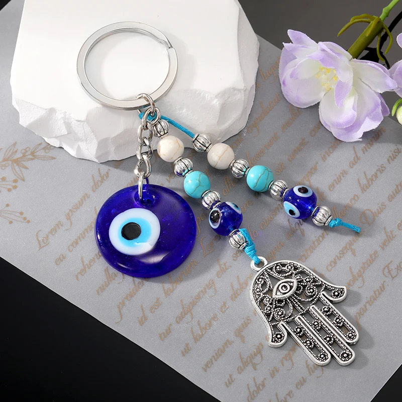 Blue Evil Eye Hamsa Hand Beads Portachiavi Portachiavi Per Donna Uomo Glass Vintage Round Turkish Eye Fatima Hand Nappa Bag Car Jewelry