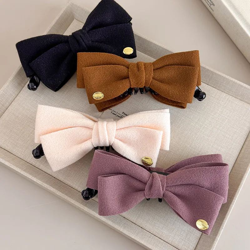 Anspruchsvoller doppelseitiger Tweed-Bananenclip mit Schleife für Herbst/Winter und goldenem Etikett, vertikaler Clip, Pferdeschwanz-Haar-Accessoire