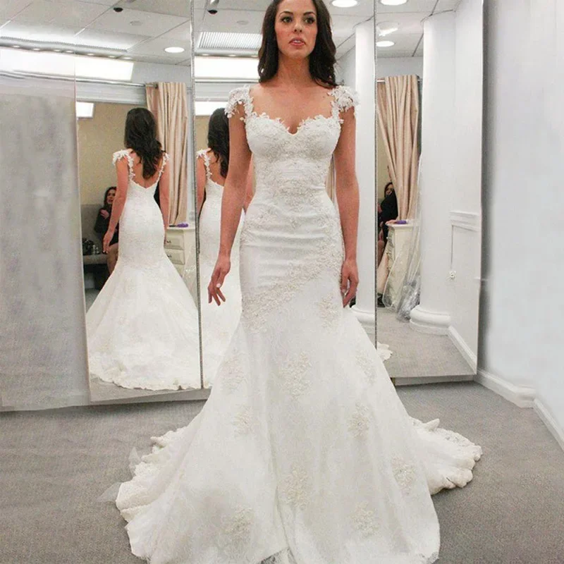 

Spaghetti Straps Sweetheart Tulle Mermaid Wedding Dresses Fashion Appliques Bride Dresses African Wedding Gowns Boho Backless