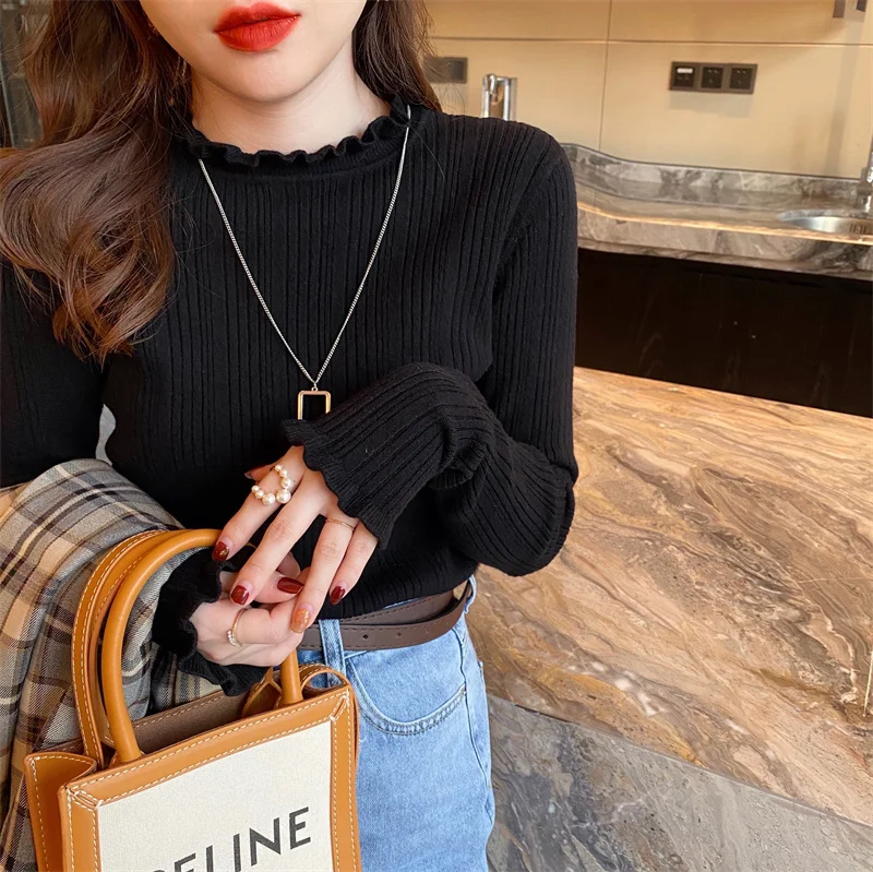 Pull à col montant pour femme, vue de profil