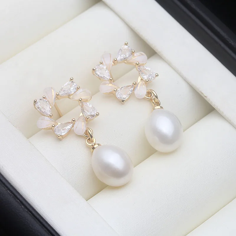 white pearl earring