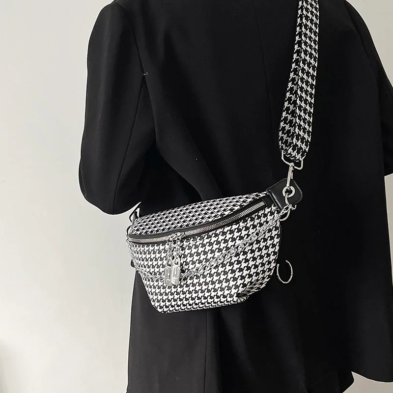 Close-up of plaid pattern and chain
