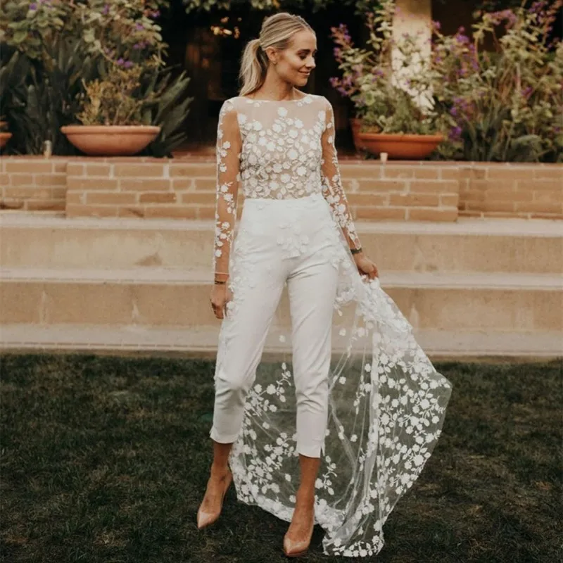 

Modern O-Neck A Line Backless Wedding Pant Suits For Brides Brush Train Lace Sheath Appliques Wedding Jumpsuits Women 2023