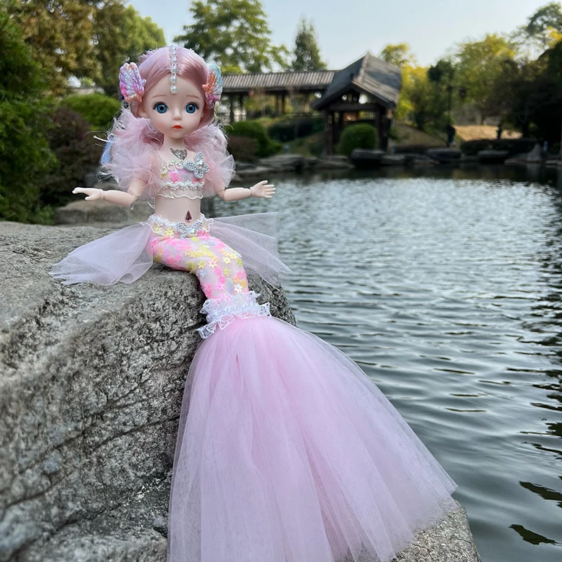 https://ae01.alicdn.com/kf/S5eb4904fbaed409f90090b4587250890F/Cute-Mermaid-Doll-Bjd-with-Light-Singing-Music-Song-12inch-Baby-Mermaid-Toys-Joint-Movable-Mermaid.jpg