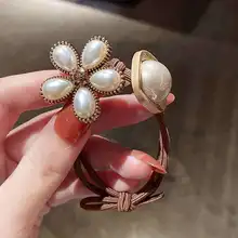 

2022 New Flower Hair Circle Temperament Pearl Head Rope Net Red Simple High-End Headdress Tie Hair Rubber Band Female