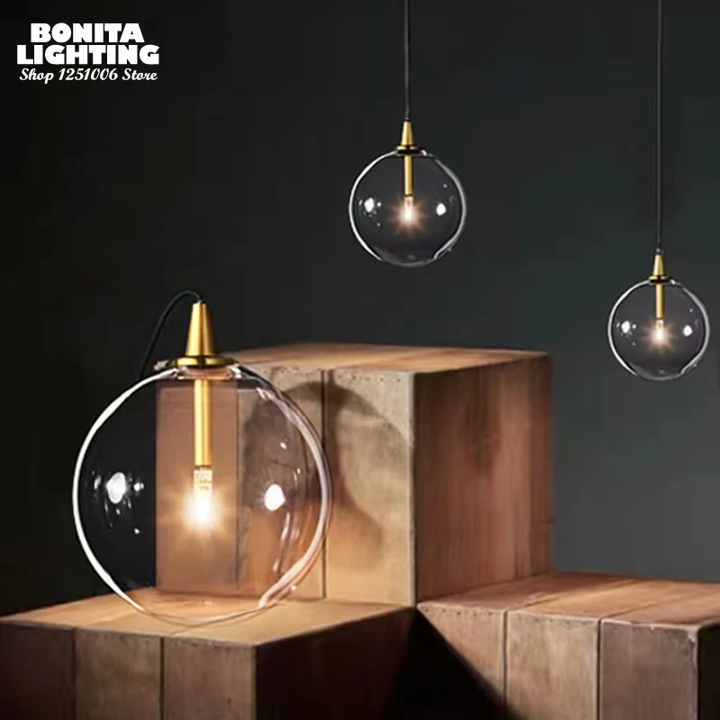 

Transparent Glass Ball Pendant Lights for Restaurant Decor Copper Top Bubble Ball Glass Nordic Pendant Lights Interior Design