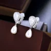 CWWZircons Elegant Design Shiny White Cubic Zircon Dangly Bridal Wedding Party Clip on Pearl Earrings No Piercing Hole CZ496 3