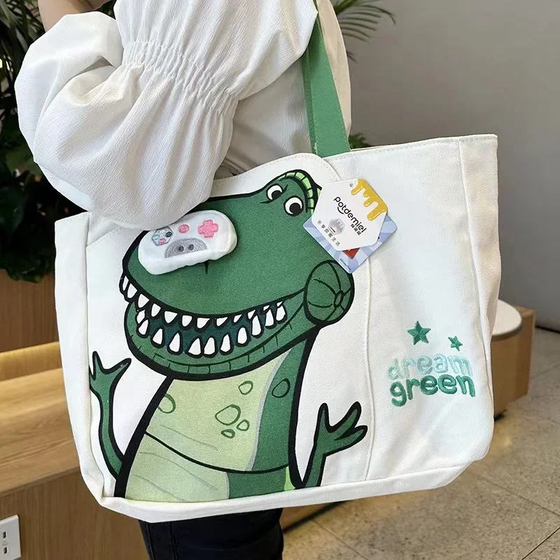 

Disney Cute Tote Canvas Bag Ham Pig Cuddle Dragon Commuter Bag Female College Students Large Capacity Class Shoulder Bag