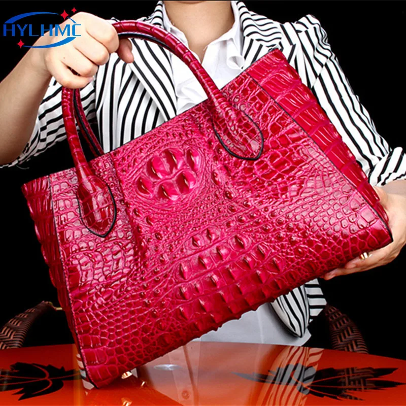Sac à main rond en cuir robuste à motif reptile main image 0