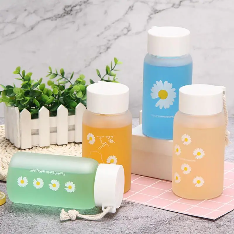 https://ae01.alicdn.com/kf/S5ef8de773e8a459bb99dd0602ec538a1a/500ml-Plastic-Water-Bottles-Daisy-Clear-Bottle-Outdoor-Sports-Water-Cup-Water-Mug-Student-Portable-Mug.jpg