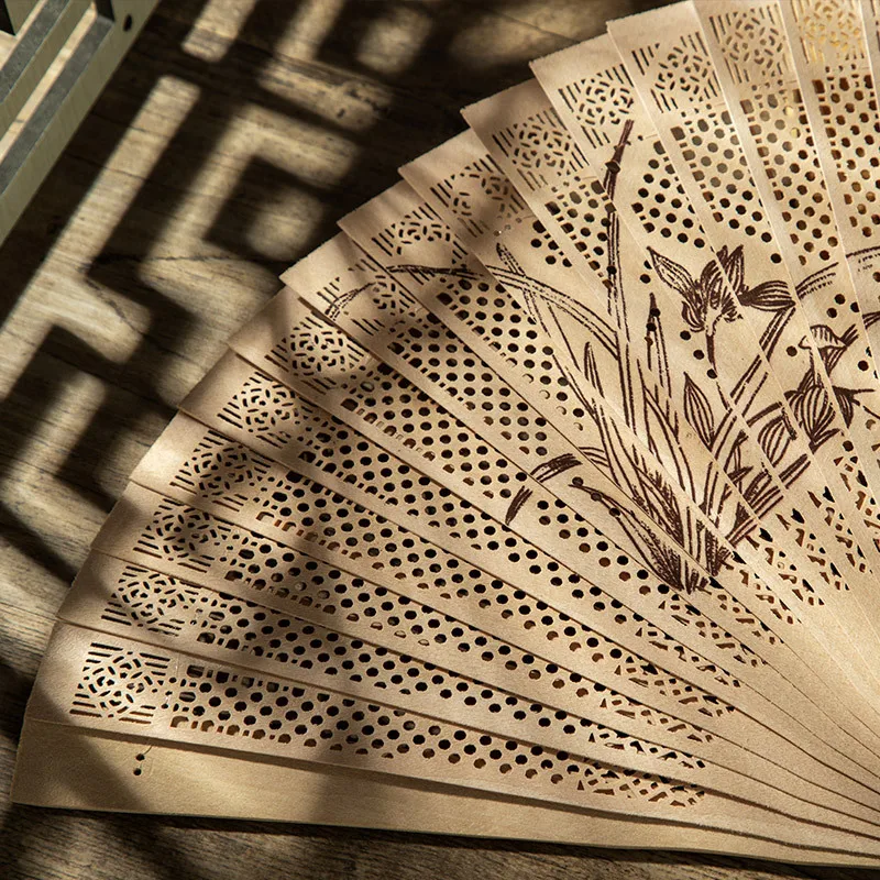 

Antique Handmade Fan Double-sided Printing Hollow Folding Fan