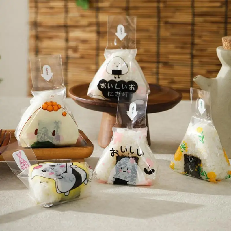 새로운 100Pcs 스시 가방 사랑스러운 일본 삼각형 쌀 공 일회용 포장 가방 스시 만들기 금형 도시락 액세서리