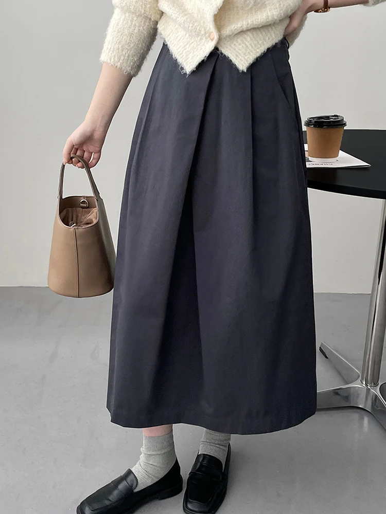 [EAM] High Waist Apricot A-line Irregular Pleated Elegant Half-body Skirt Women Fashion Tide New Spring Autumn 2026 1DH3802