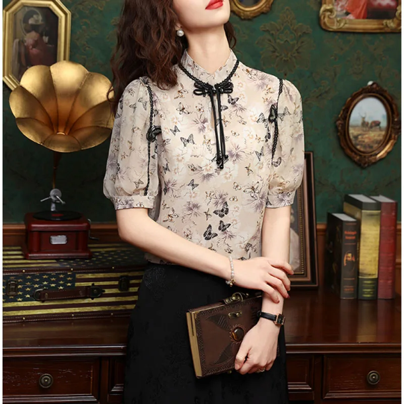 

Summer New 2024 Printed Stand Collar Button Spliced Puff Sleeve Fashion Simplicity Versatile Commuter Loose Chiffon Tops