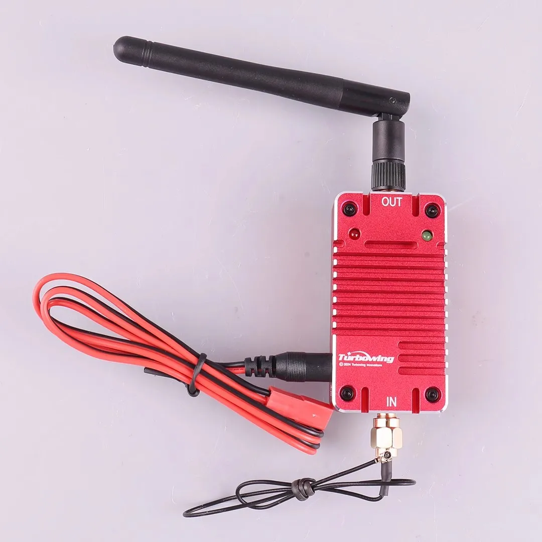 Boîte de l'amplificateur de puissance 2.4GHz 4W pour télécommande de drone, avec accessoires et câbles inclus.