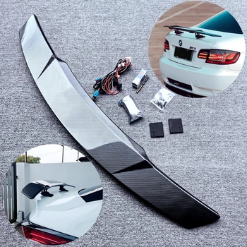 Per berlina universale ascensore elettrico spoiler intelligente luce a led ala del bagagliaio ABS nero lucido e modifica dell'auto dall'aspetto carbonio