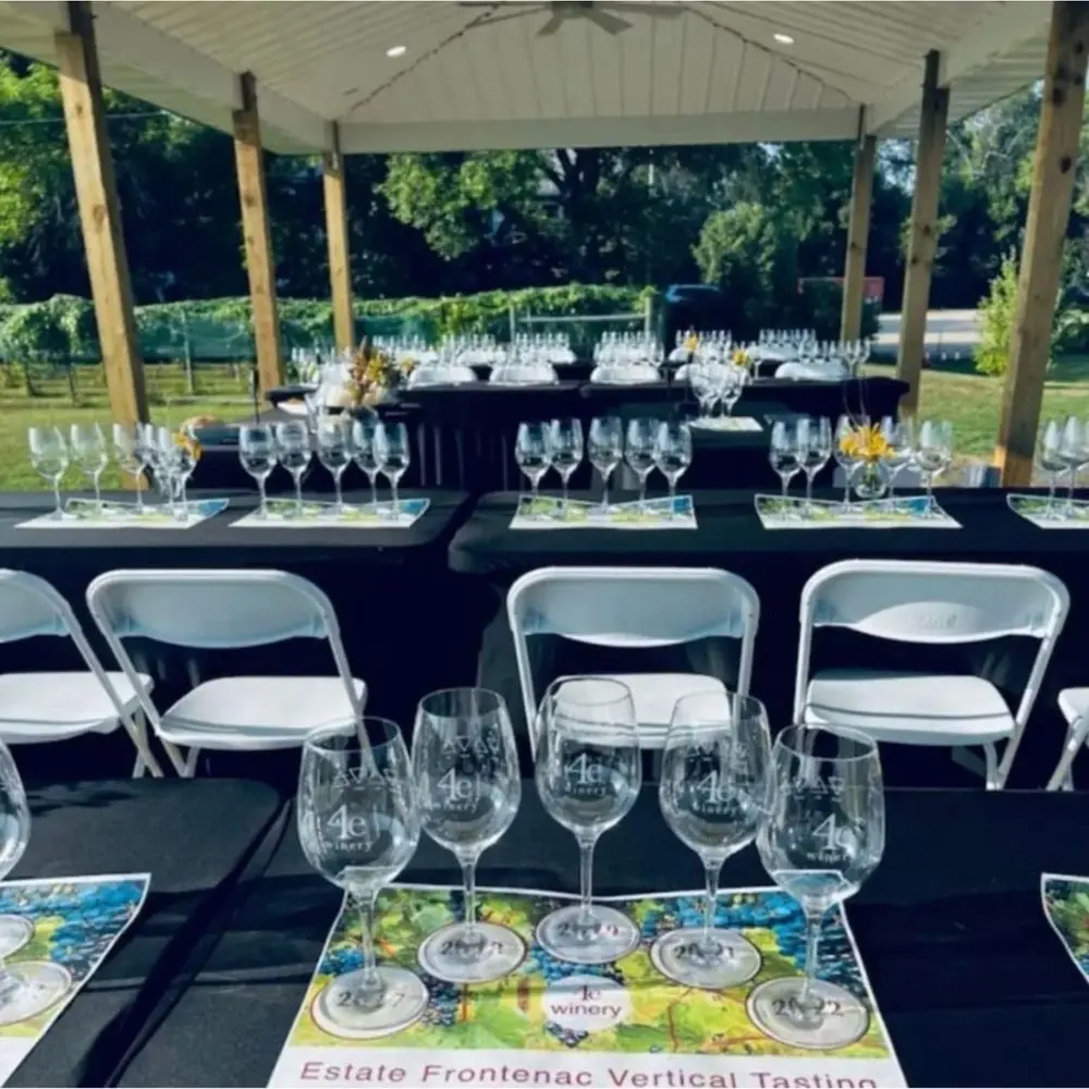 white folding chairs lined up for event