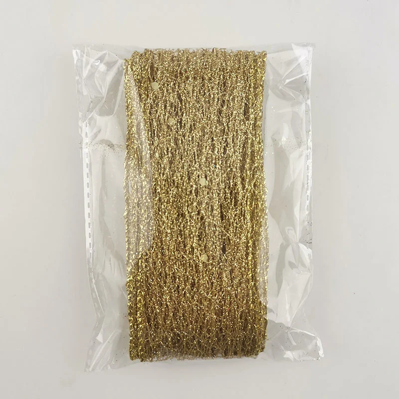 A 2-meter roll of 50mm shiny gold hollow-out ribbon gold 06