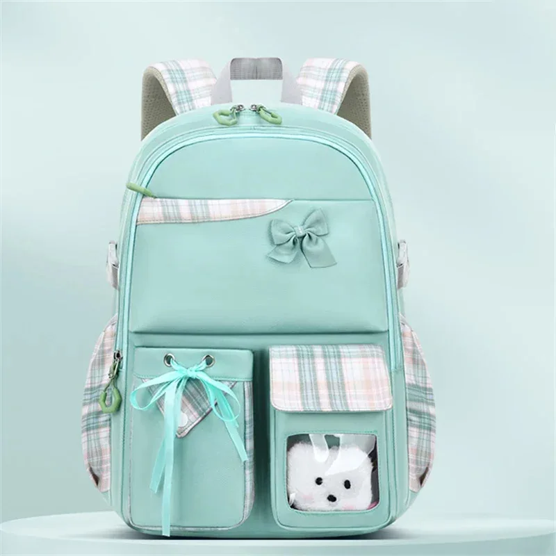 2024 New Bowknot schoolbag for teenage girls High capacity orthopedic backpack  With cartoon pendant School Bags 2 Size Satchel