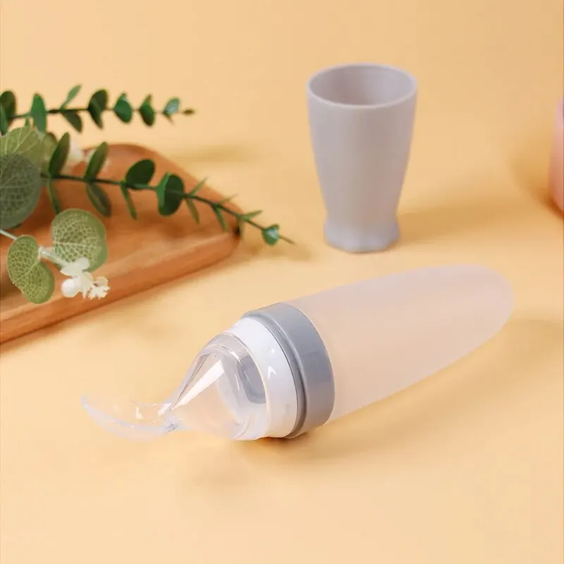 Silicone Feeding Spoon 1 Pcs Baby Rice Cereal Bottle Dropper Squeeze Soft Non Slip Rocket Shape