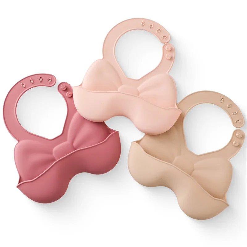 Bavaglini impermeabili per bambini bavaglini in Silicone per bambini grembiuli con fiocco carino bavaglino per bambini bavaglino in Silicone morbido regolabile per bambina