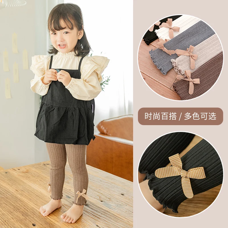 

Baby girl spring and autumn skin-friendly breathable Korean version rolled plaid bow nine-point pants