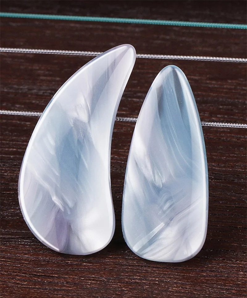 Description Picture 5 of item8PCS Guzheng Finger Picks Practical Musical Instrument Celluloid Guzheng Nail Covers Stringed Instrument Accessories Two Sizes