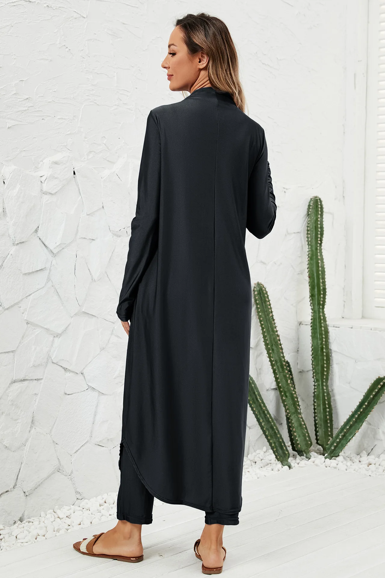 Elegant black solid color of the ladies modest swimsuit – perfect for water activities like swimming and diving.