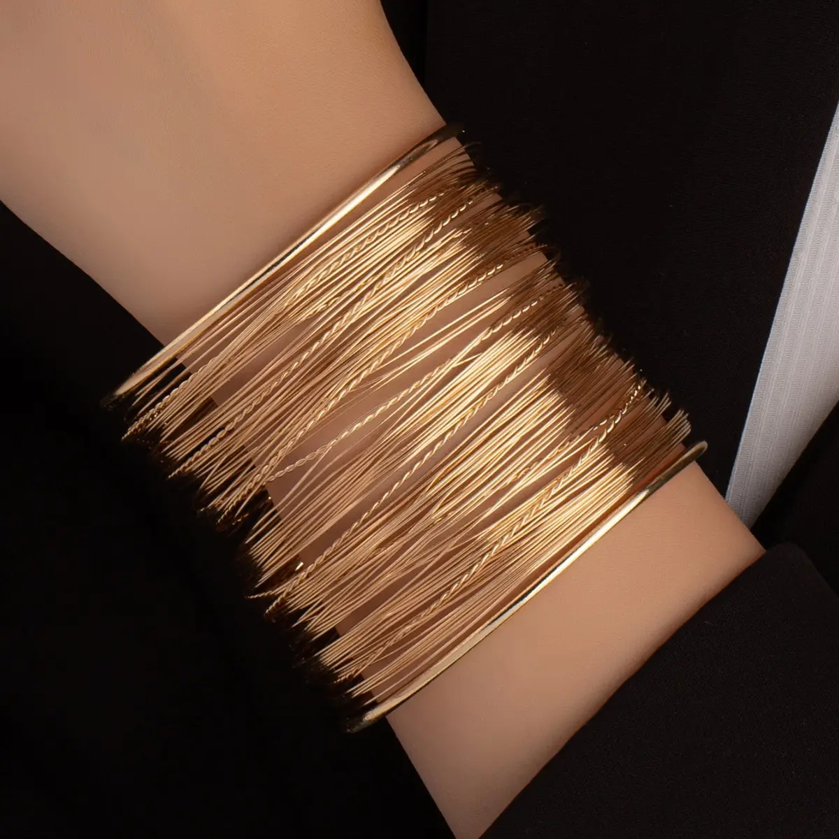 S5fbee90d79984cc3a18f6107b818ec53s Metal Style European and American Atmosphere Exaggerated Hip-hop Hemp Thread Gold-color Wire Gold-color Bracelet Mallzona