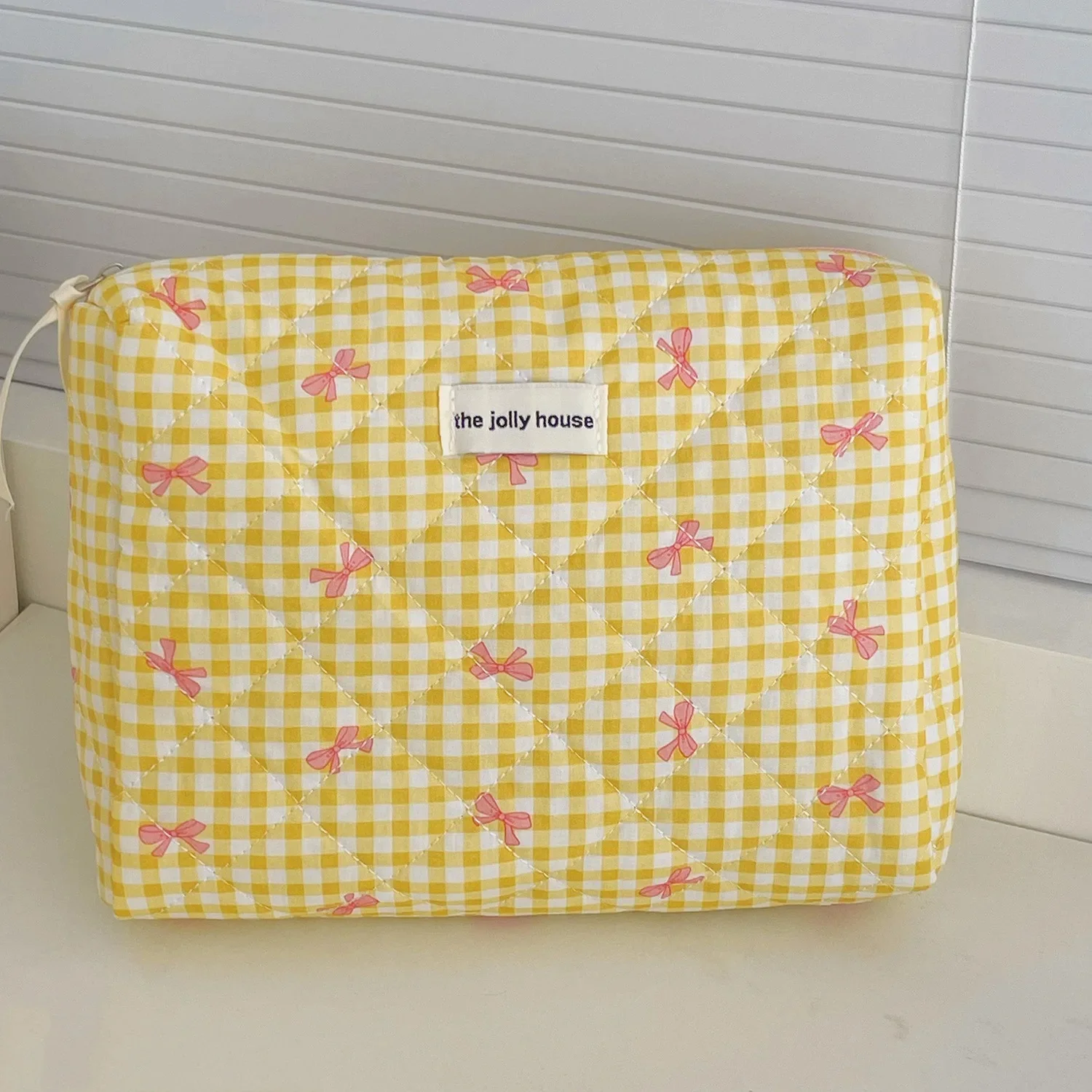 Plaid bow clutch