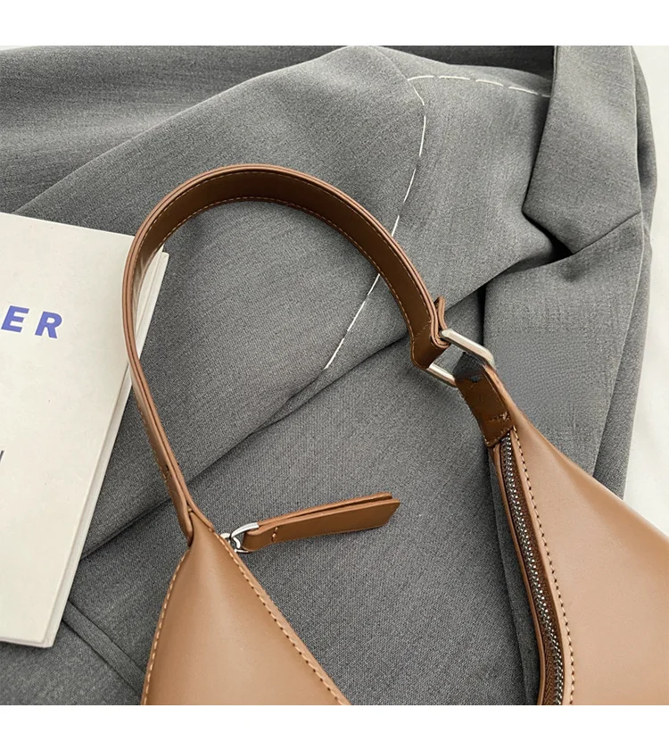 Sotto le ascelle da donna 2024 nuovo modello minimalista a mezzaluna con temperamento versatile, viaggio casual, consistenza portatile,_voghion.com