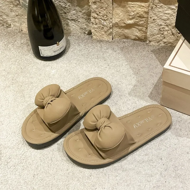 

Новинка 2024, модные однотонные легкие женские шлепанцы из ткани на плоской и низкой подошве, с круглым ремешком и ремешком на щиколотке