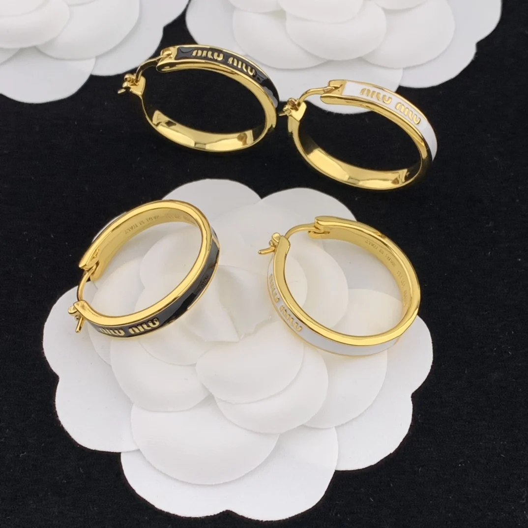 

Black and white fashionable versatile letter enamel earrings