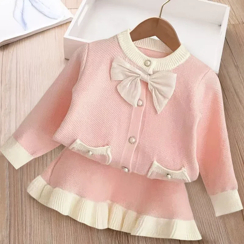 

2024 Girls Autumn Dress Bow Korean Edition Children's Set Baby Foreigner Knitted Cardigan Two Piece Set 2-8 Year Old Top and Bot